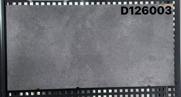 1200-Tile-D126003-scaled-1.jpg Gray tile sample labeled D126003 on display.