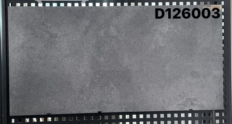 Gray tile sample labeled D126003 on display.