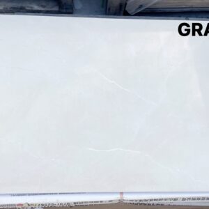 White tile with subtle veining, labeled GRA12601.