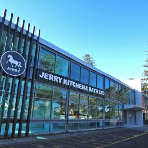 Exterior of Jerry Kitchen & Bath Ltd building with glass facade.