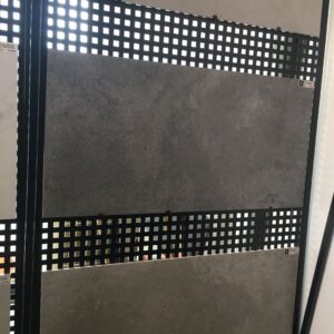 Gray stone tiles displayed on a black grid panel.