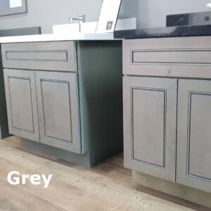 Grey kitchen cabinets with a modern design and sleek finish.