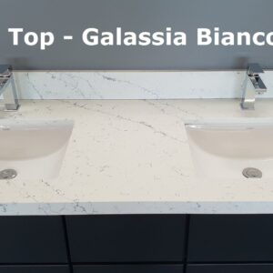 Double sink with Galassia Bianco countertop in modern kitchen.