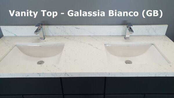 Double sink with Galassia Bianco countertop in modern kitchen.