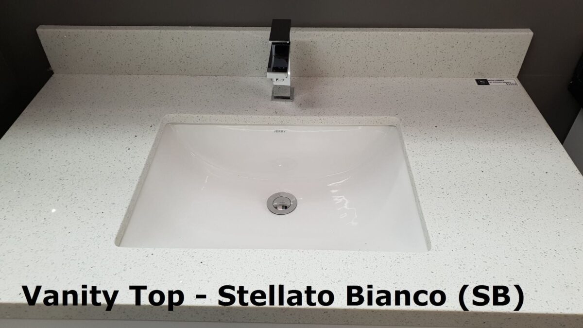 Vanity top with Stellato Bianco finish and modern faucet.