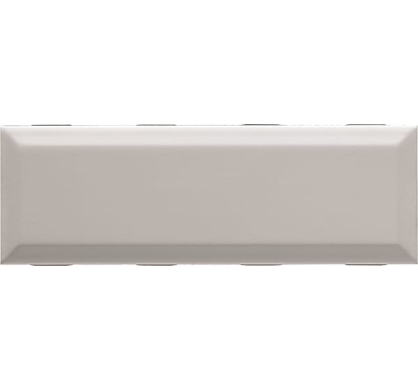 Rectangular beige ceramic tile with beveled edges.