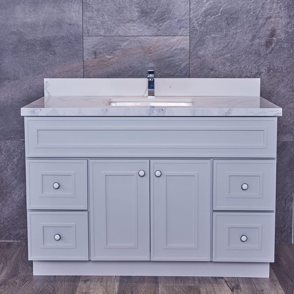 Gray bathroom vanity with marble countertop and modern faucet.