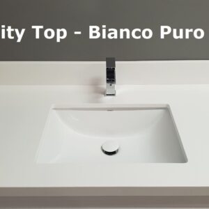 White vanity top with integrated sink and modern faucet.