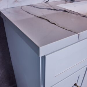 Marble countertop with sink in modern kitchen design.