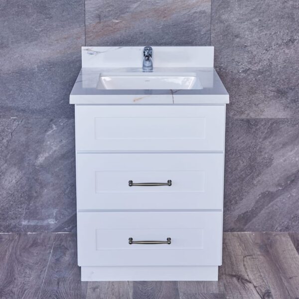 WS-3VDB2420-32.5-1-1.jpg White bathroom vanity with three drawers and a marble countertop.