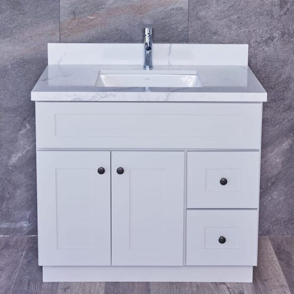 WSLG-3V3620DR-1-1.jpg White bathroom vanity with marble countertop and chrome faucet.