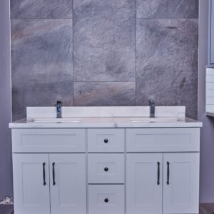 Modern bathroom vanity with dual sinks and gray stone backsplash.