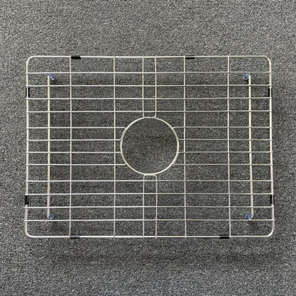 singleS-scaled-1.jpg Stainless steel sink grid on a textured surface.