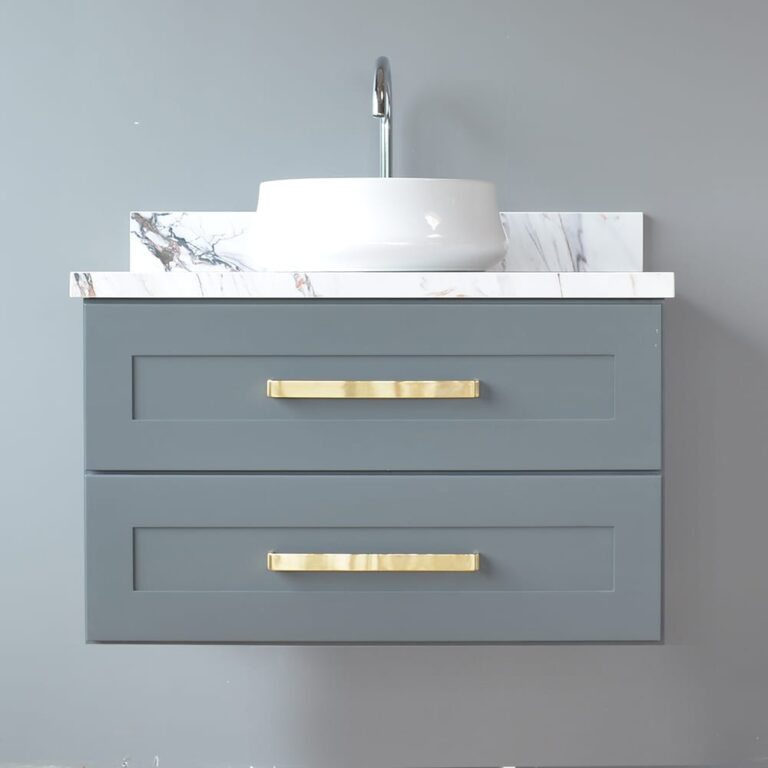 Wall-mounted grey vanity unit with gold handles, marble countertop, and white above-counter basin