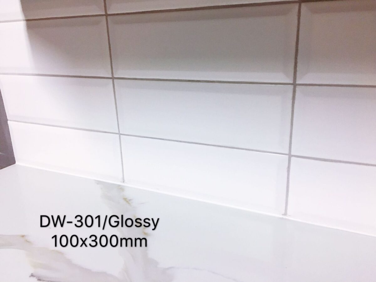 Glossy white tiles, DW-301, 100x300mm, on a kitchen wall.