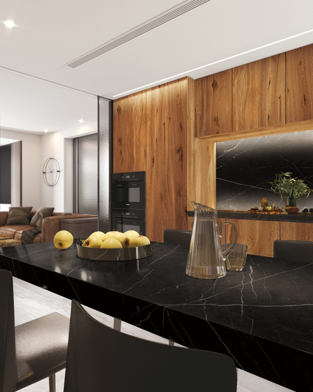 Modern dining room with black marble table and wooden accent wall.