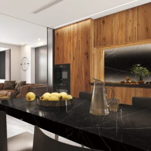 Modern dining room with black marble table and wooden accent wall.
