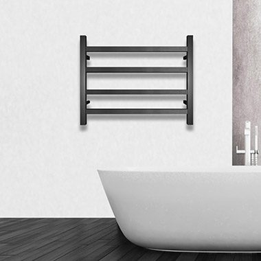 Modern black towel rack above white bathtub in minimalist bathroom.