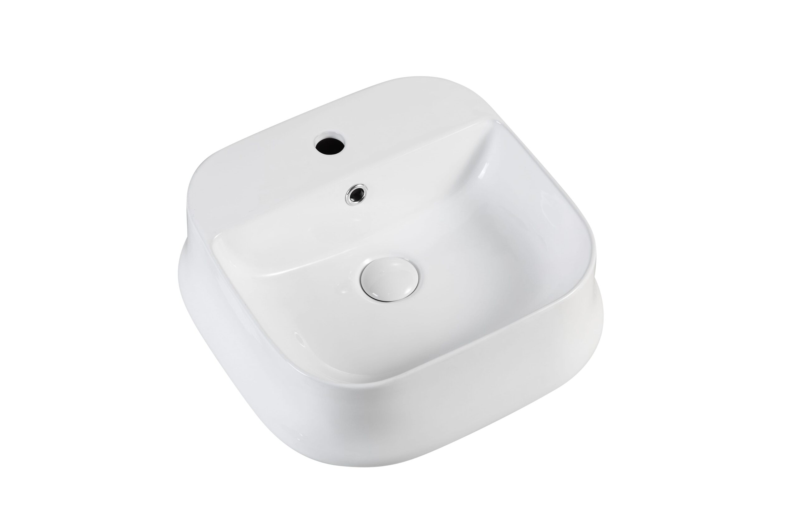 White ceramic bathroom sink with overflow hole and drain.