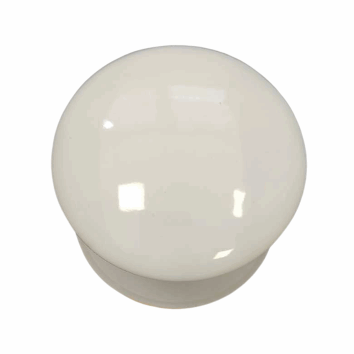 White ceramic cabinet knob against a plain background.