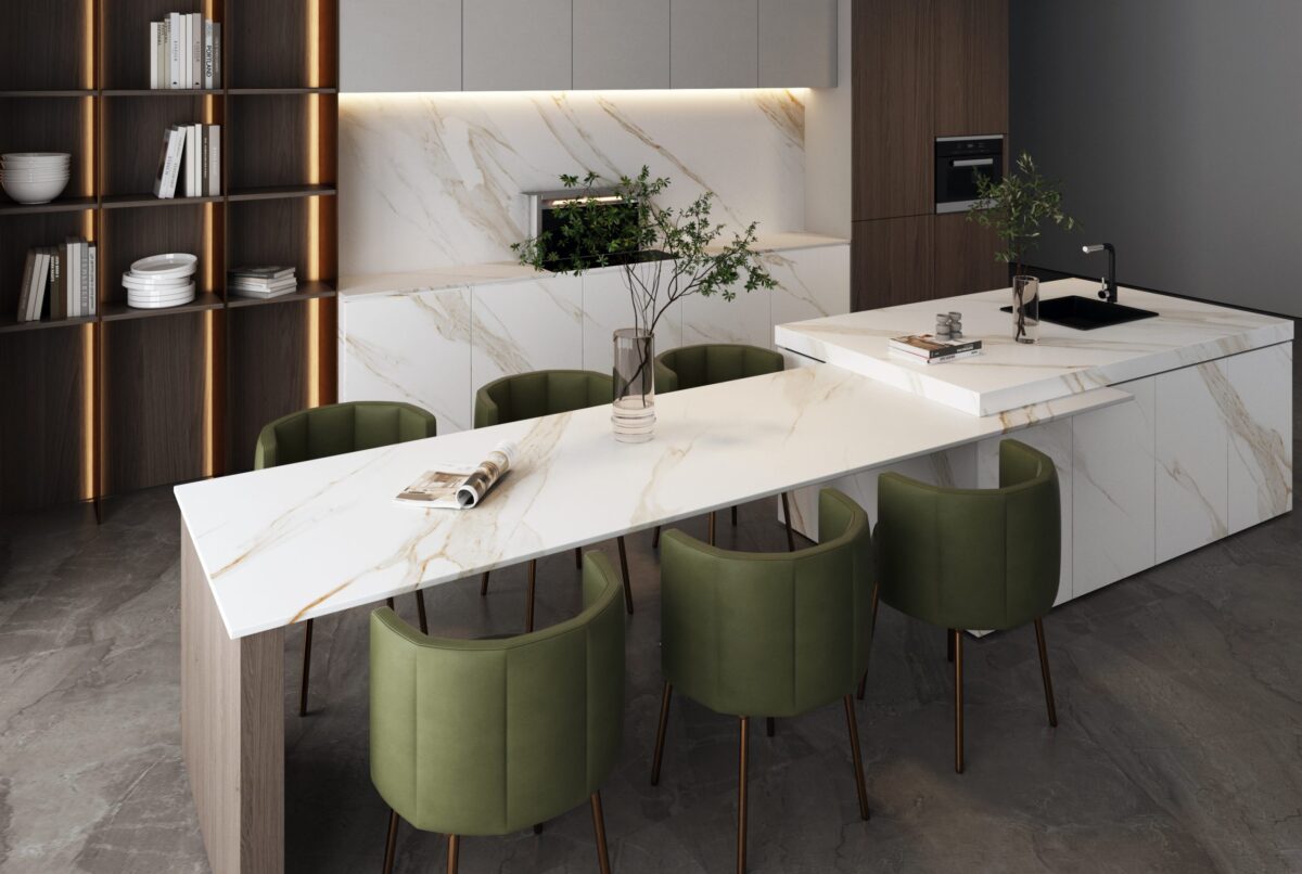 Modern kitchen with marble countertops and green chairs.