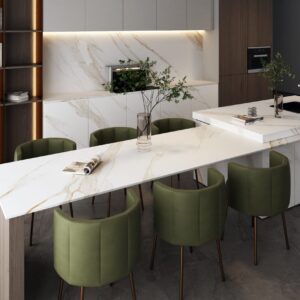 Modern kitchen with marble countertops and green chairs.