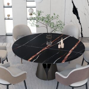 Modern dining room with a round black marble table and six chairs.