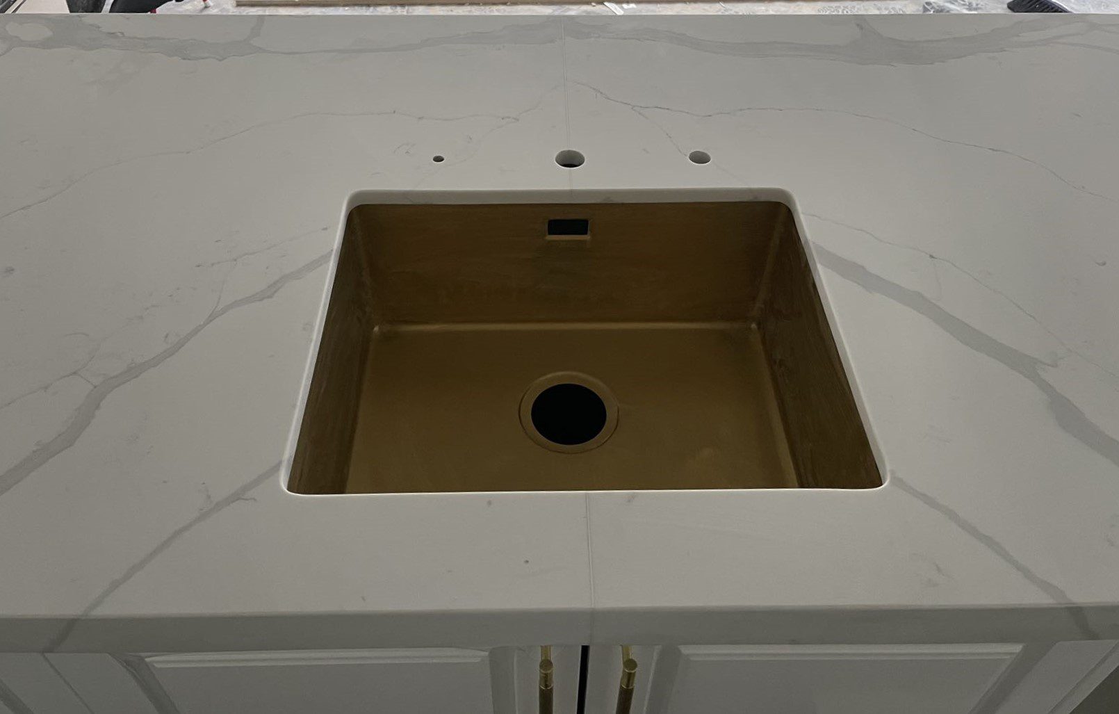 Calacatta Sky Quartz countertop with a built-in sink.