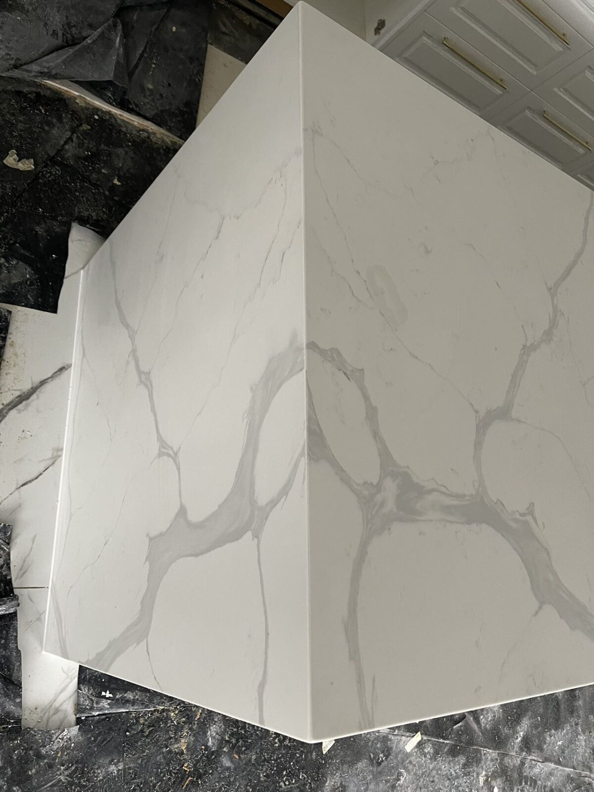 Calacatta Sky Quartz countertop with gray veining.