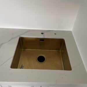 Calacatta Sky Quartz countertop with a square sink.