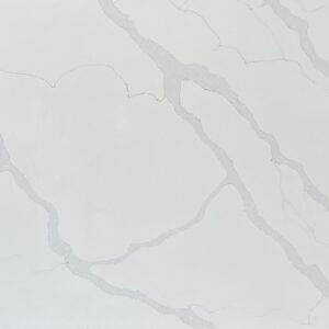 White marble countertop with subtle gray veining.