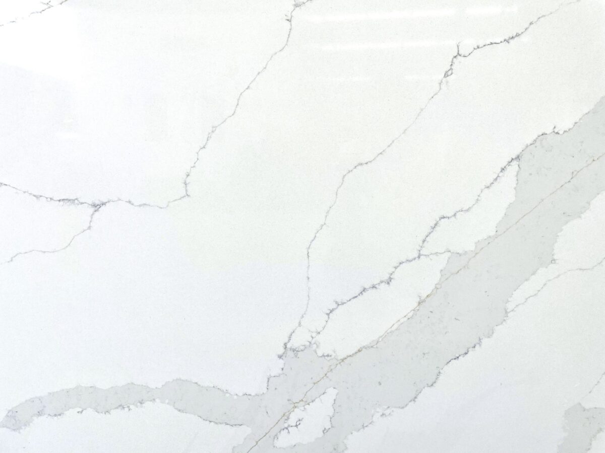 White marble countertop with subtle gray veining.