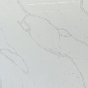 White marble countertop with subtle gray veining.