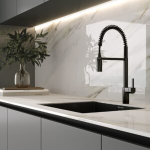 Modern kitchen with marble backsplash and sleek black faucet.