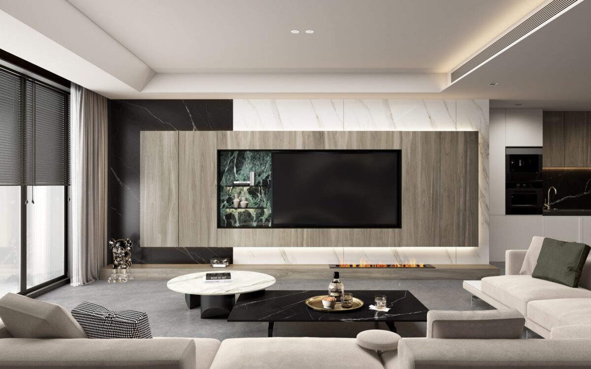Modern living room with large TV, marble accents, and sleek furniture.