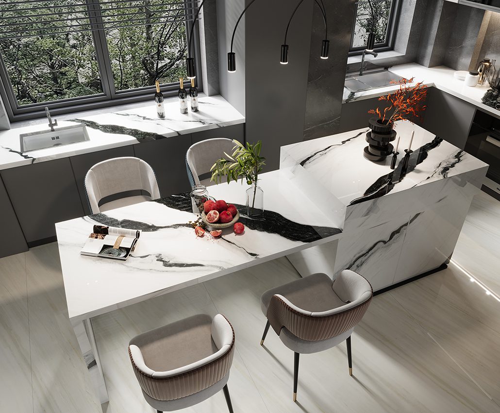 Modern kitchen with marble countertops and stylish bar stools.