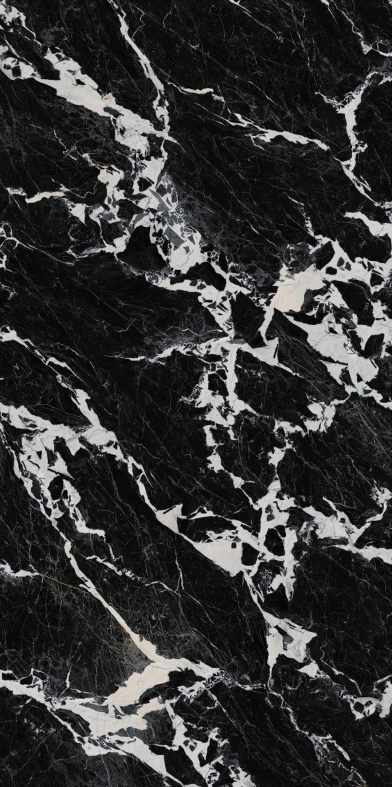 Black marble texture with white veining pattern.