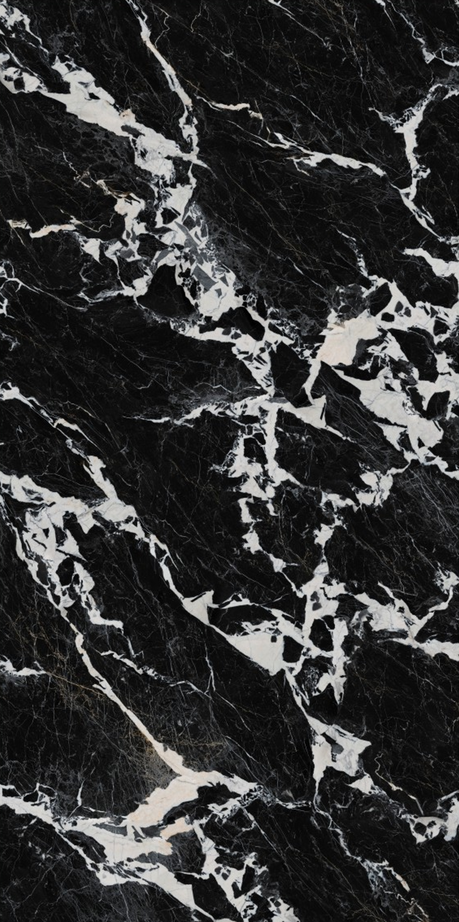 Black marble texture with white veining pattern.