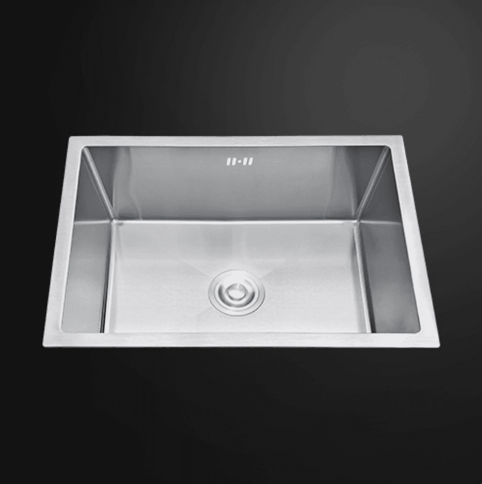 Stainless steel kitchen sink on a dark background.