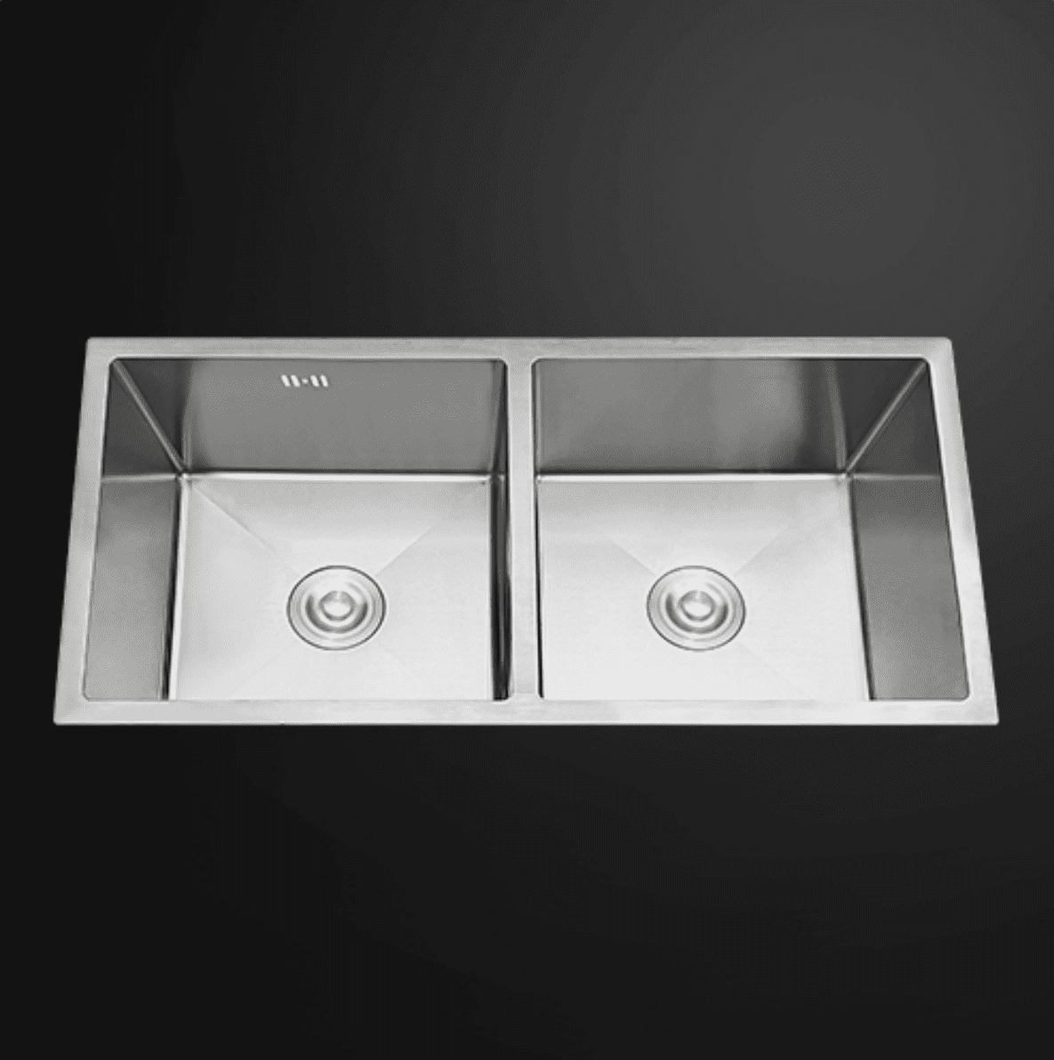Double stainless steel kitchen sink with modern design.
