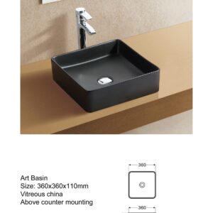 Square black art basin with chrome faucet on wooden counter.