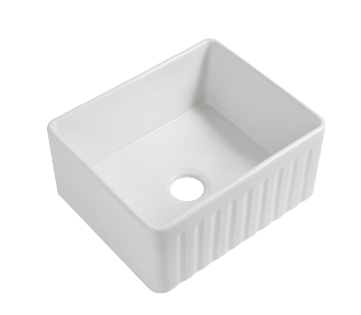 White ceramic kitchen sink with a central drain hole.