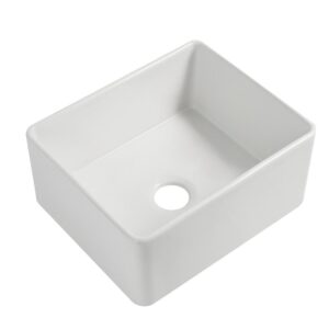 White ceramic kitchen sink with a central drain hole.