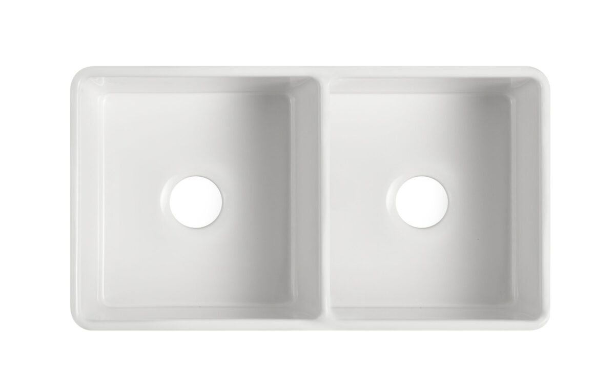 Double bowl white ceramic kitchen sink, top view.