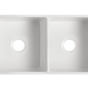 Double bowl white ceramic kitchen sink, top view.