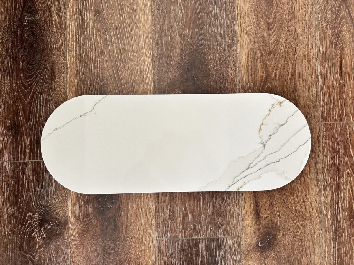 P1007 Marble serving platter on wooden floor.