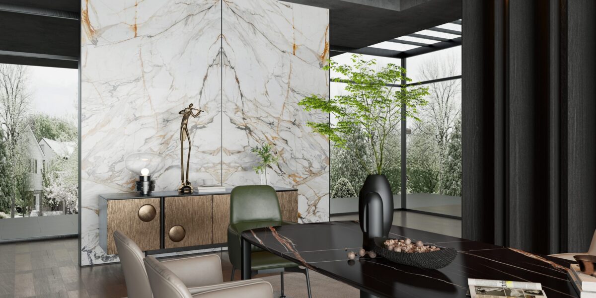 Modern living room with marble wall, green chair, and large window view.