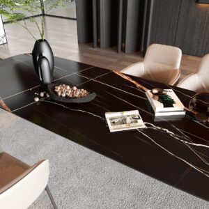 Modern black dining table with decorative items and chairs in a stylish room.