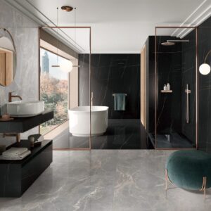 Modern bathroom with marble tiles, freestanding tub, and large window view.