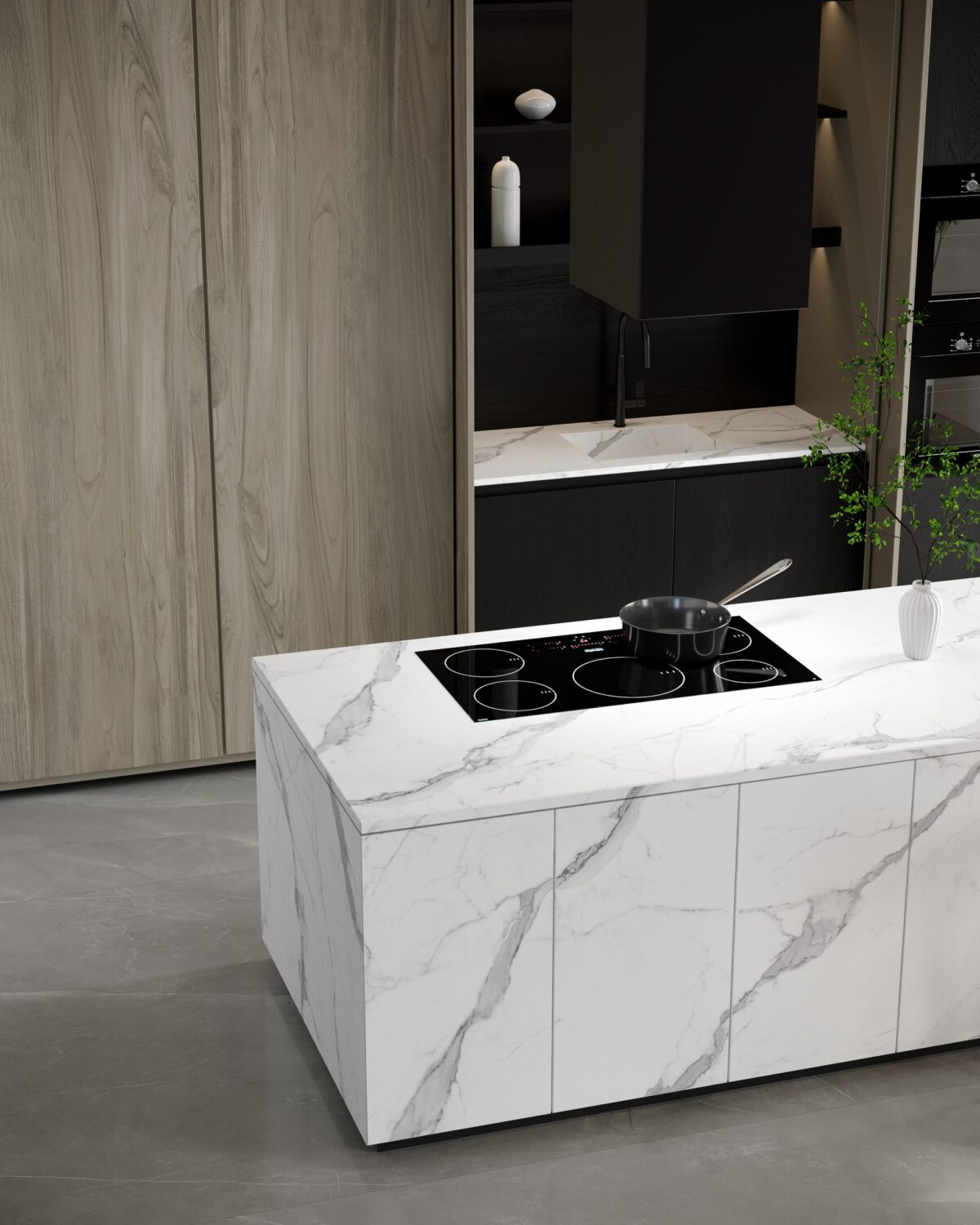 Modern kitchen island with marble countertop and built-in stovetop.